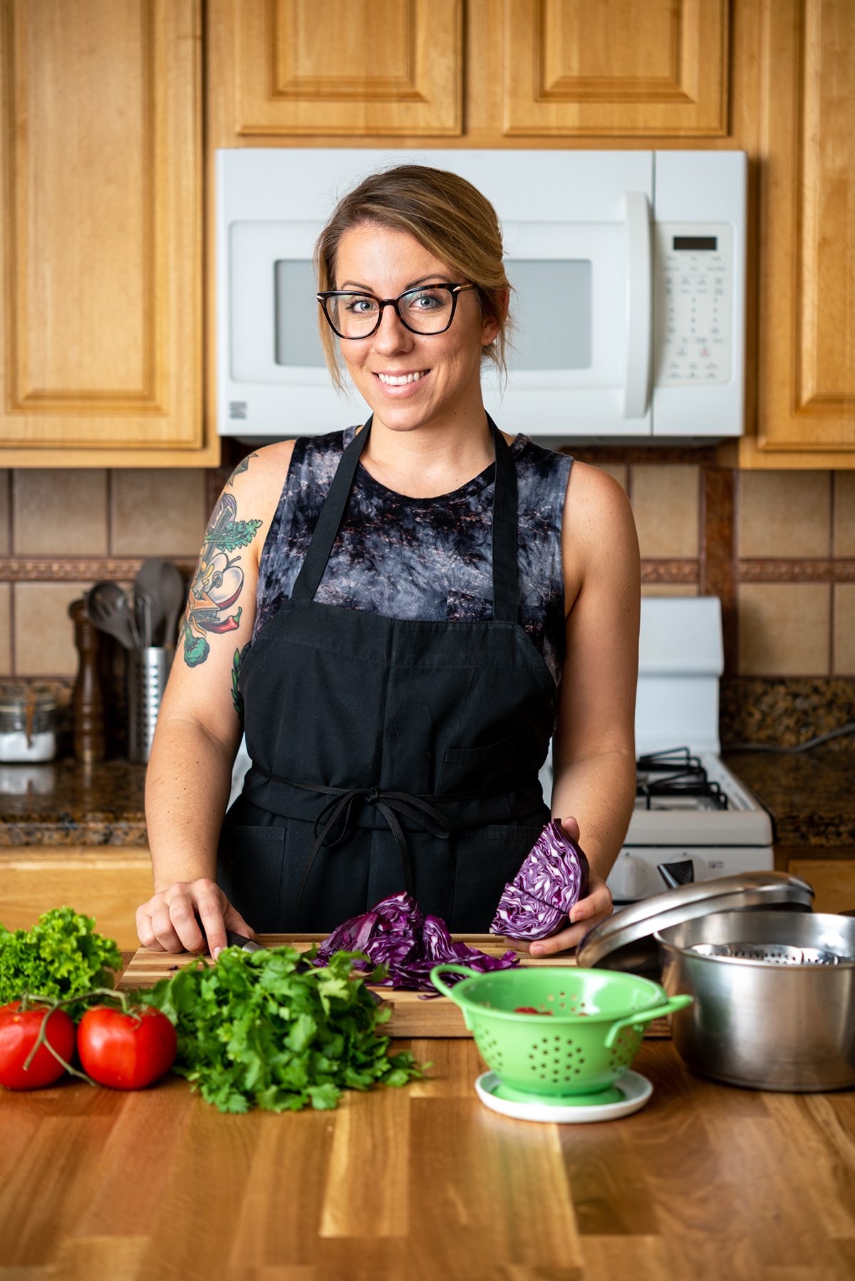 Jackie Sobon of Vegan Yack Attack in her kitchen, featured in an interview about veganism, creativity, and everyday life.