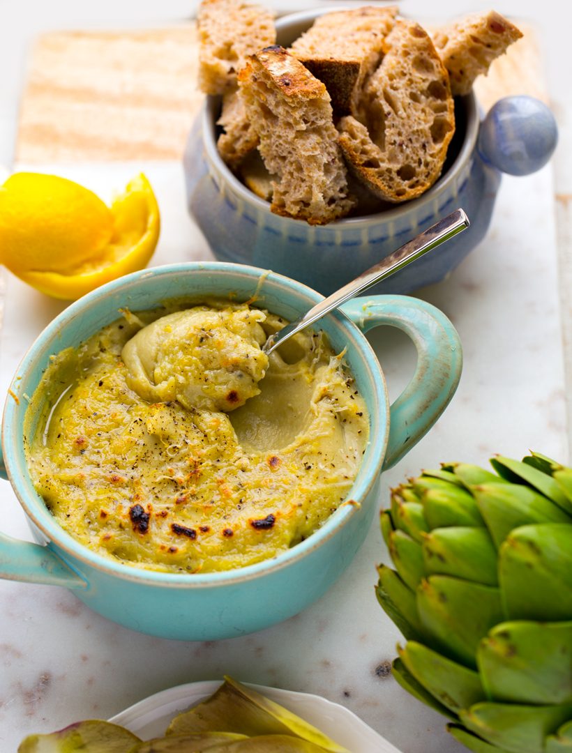 Velvety white bean and fresh artichoke dip flavored with lemon, pepper and garlic, served with crusty bread.