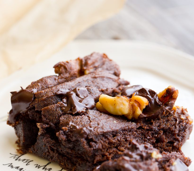 Rich vegan chocolate walnut brownies with chewy edges and gooey chocolate chunks.
