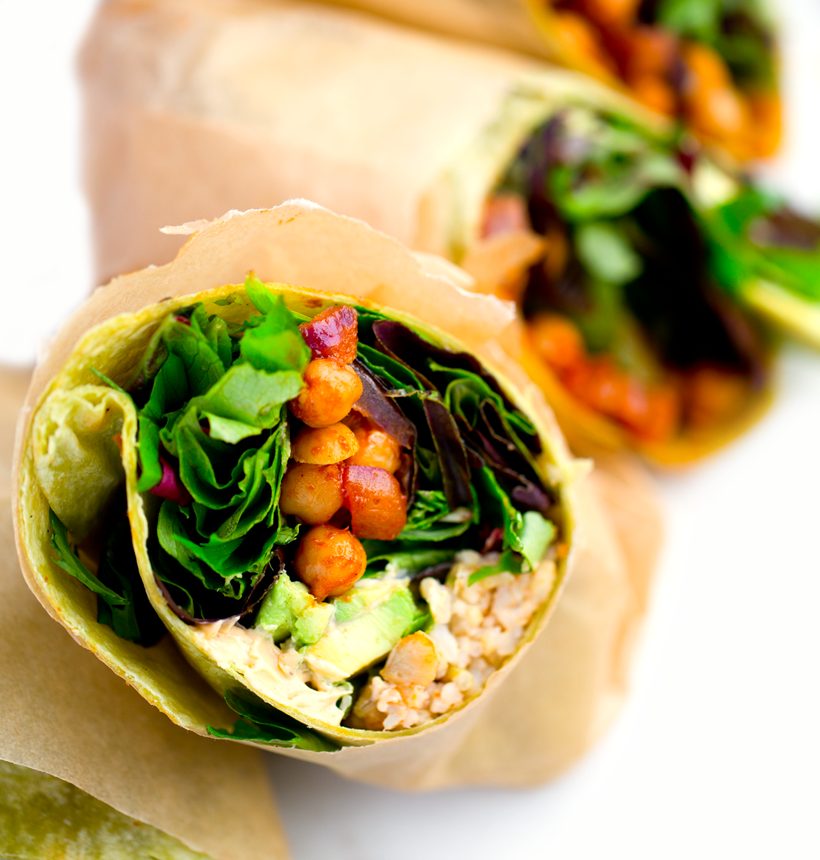 Wraps filled with BBQ chickpeas, leafy greens, creamy avocado and brown rice.